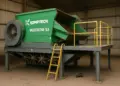 Worker injured after fall from unguarded compost screening machine