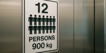Lifts face criticism for outdated capacity signs amid rising obesity rates