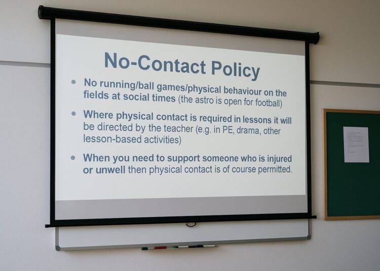 Parents outraged by school’s no-contact policy following detention for high-five